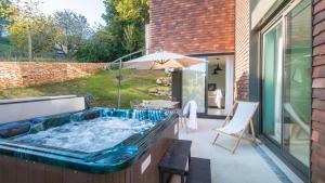 Appartements Cote Jardin avec Jacuzzi Privatif et parking prive : photos des chambres