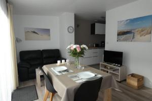 Appartements Les Dunes Blanches : photos des chambres
