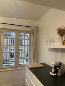 Appartements Spacieux appartement au coeur du centre historique de Dinan : photos des chambres
