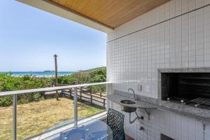 Aquarelle by Viva - Prédio nos Ingleses pé-na-areia com piscina