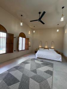 بيت أرض الثراء Rich Land House