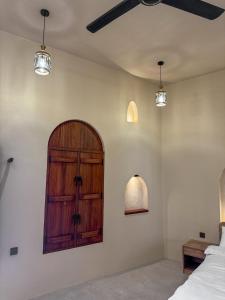بيت أرض الثراء Rich Land House