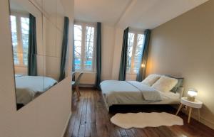 Appartements L’Atmosphere | Centre-Ville Netflix | Mon Groom : photos des chambres