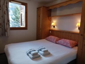 Appartements Residence Les Alpages 4 etoiles - Appartement 4 personnes - Piscine, Hammam, Sauna, Jacuzzi - ValCenis 73480 : photos des chambres