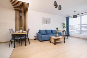 Dark Blue Apartment with Parking and Furnished Balcony in Kraków by Renters