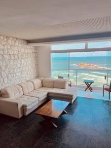 Apartamento frente mar Guarujá Pitangueiras pé na areia