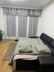 Appartements appartement 5min gare RER Disneyland Paris val d'Europe la vallee Village parking inclus : photos des chambres