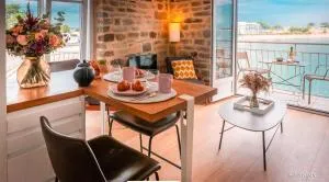 RÉF 236 - LARMOR-PLAGE type 2 avec 3 balcons pleine vue mer et au pied du centre - Larmor-Plage