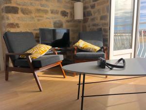 Appartements REF 236 - LARMOR-PLAGE type 2 avec 3 balcons pleine vue mer et au pied du centre : photos des chambres