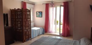 Appartements Grand gite dominant le golfe d'Ajaccio : photos des chambres