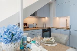 WINNINGS APARTAMENTY NAD MORZEM RIVIERA BLUE