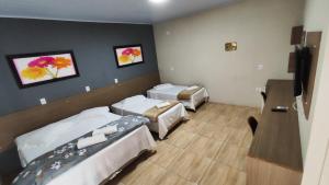 Pousada Queiroz em Frente ao Parque Beto Carrero