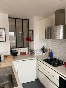 Appartements Deux pieces, plein centre avec vue sur les toits : photos des chambres