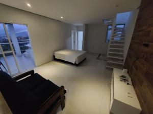 Apartamento a 50m praia maitinga, wifi, churrasqueira na varanda