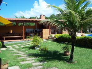 Casa de seis suites na beira do mar