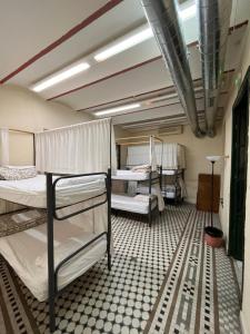 Bed in 6-Bed Mixed Dormitory Room room in San Isidoro Hostel Sevilla