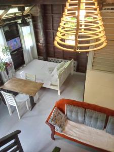 Bayawan Sunset Inn next to julsam and orange house