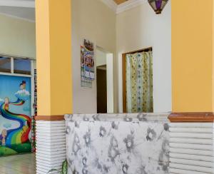 OYO 93521 Wisma Flamboyan NearTaman Makam Pahlawan