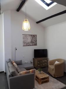 Appartements Appartement cosy avec cour : photos des chambres