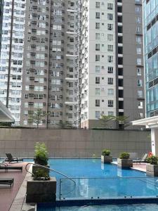 Escape 1BR One Uptown BGC w Sound System