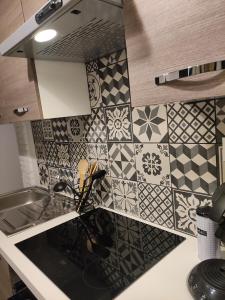 Appartements Bienvenue chez Coco : photos des chambres