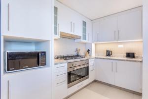 WeHost - Downtown Luxury 4BR Apartment with Panoramic Views