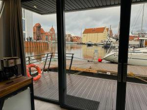 Domki na wodzie - Apartament Karawela Gdańsk - Stare Miasto flota Possession pl