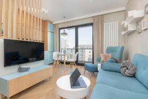 Bright Blue Apartment with Balcony, Parking and Air Conditioning in Warsaw by Renters