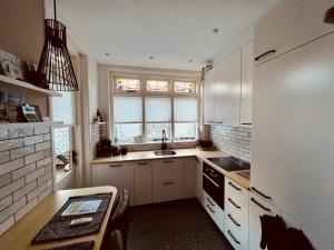 Stijlvolle benedenwoning Singel