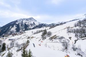 Appartements Les Aiguilles d'Arves - Vue montagne a au Corbier : photos des chambres