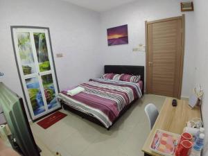 Kota Kinabalu Four Seasons Homestay 沙巴亚庇四季小屋
