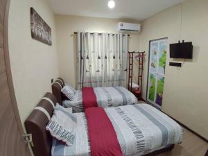 Kota Kinabalu Four Seasons Homestay 沙巴亚庇四季小屋