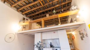 Eccentric Mouzinho Mezzanine by LovelyStay