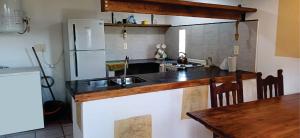 CASA A 6 CUADRAS PLAYA PUNTA MOGOTES, P6 PERS.