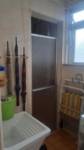 Apartamento Lia Pitangueiras Centro Guarujá , 150 metros da Praia Vista Mar ap da dona lia