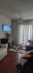 Apartamento Lia Pitangueiras Centro Guarujá , 150 metros da Praia Vista Mar ap da dona lia