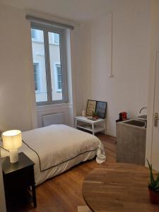 Appartements Appartement Place des Terreaux Presqu'Ile : photos des chambres