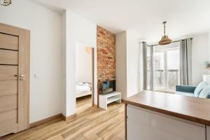 Wola Homely Apartment #88 by BookingHost