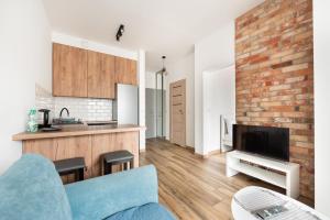 Wola Homely Apartment #88 by BookingHost