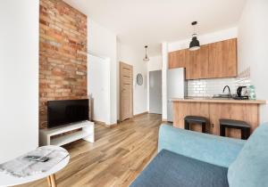 Wola Homely Apartment #106 by BookingHost