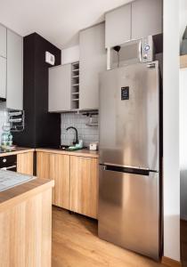 Daniszewska Cosy Apartment by BookingHost