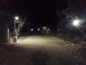 Nature Stay-The Himalayan Foot Hills-JANAKI SADAN Two Bed Room Garden Home with attached bath room in each room and Kitchen with garden facing dinning space with Badminton Court in Mango Orchard