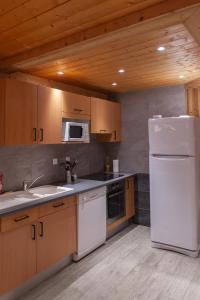 Appartements Le Neiger - Appartement Emeraude : photos des chambres