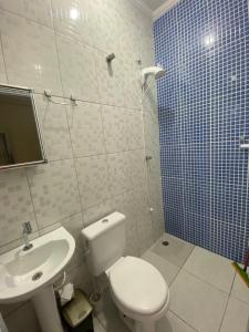 Casa aconchegante prox ao Sesc Bertioga 2 quartos, 2 banheiros