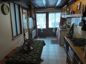 Appartements AUX 4 SAISONS : photos des chambres
