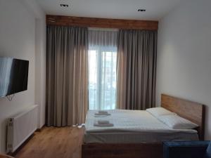 Evdo Apartments F2 White Studio