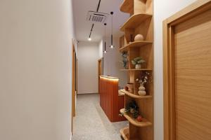 Hop Inn Rooms & Suites