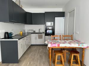 Appartements Charmante maison avec terrasse : photos des chambres