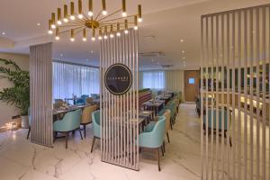 Grand Continent Hebbal A Sarovar Portico Affiliate Hotel