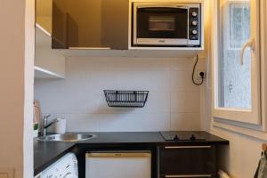 Appartements Cosy Room w Balcony - Saint-Mande : photos des chambres